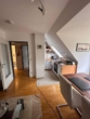 Blick in die offene Küche - Schicke 1,5 Zimmer Wohnung mit Balkon in einer gepflegten Wohnanlage in Hamburg-Niendorf zu vermieten !!