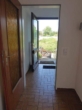 Eingangsbereich mit Garderobe - Wohlfühloase ! 3-4 Zimmer Endbungalow mit schönem Grundstück in Norderstedt Garstedt zu verkaufen!!!