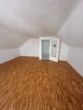 Wohnzimmer 1 - Schnucklige top sanierte 1 Zimmer DG-Wohnung im wärmegedämmten Haus in Norderstedt Garstedt zu vermieten !!