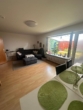 Wohnzimmer 1 - Tolle 2,5 Zimmer EG-Wohnung mit Terrasse und Garten und Einzelgarage im 2 Familienhaus in Norderstedt-Glashütte zu vermieten !!!