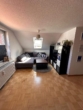 Wohnzimmer - Schnucklige 1,5 Zimmer DG-Wohnung im wärmegedämmten Haus in Norderstedt Garstedt zu vermieten !!