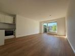 Wohnzimmer - Schöne 1 Zimmer Erdgeschosswohnung mit Terrasse und Garten in Norderstedt-Glashütte zu vermieten !!