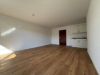 Wohnzimmer 1 - Schöne 1 Zimmer Erdgeschosswohnung mit Terrasse und Garten in Norderstedt-Glashütte zu vermieten !!