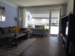 Wohnzimmer - Trendige 2 Zimmer Whg. mit einem schönen sonnigen Balkon in Norderstedt-Glashütte zu vermieten!!