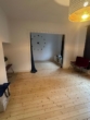 Wohnzimmer mit Blick zum Arbeitszimmer - Knuffige 2,5 Zimmer Wohnung in Norderstedt-Garstedt zu vermieten !!