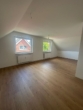 Wohnzimmer - Charmante 2 Zimmer DG Wohnung in Norderstedt-Glashütte zu vermieten !!
