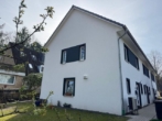 Rückansicht Reihenhauszeile - Neubau !! Exklusives 5 Zimmer Mittelreihenhaus mit Gartenanteil ( ca.100m²) in Norderstedt-Glashütte zu vermieten !!