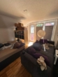 Wohnzimmer - Schnucklige top sanierte 1 Zimmer DG-Wohnung im wärmegedämmten Haus in Norderstedt Garstedt zu vermieten !!