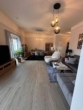 Wohnzimmer 2 - Schöner Wohnen !! Exklusive 2 Zi.Penthouse Wohnung mit riesiger Sonnenterrasse in Norderstedt - Harksheide zu vermieten !!!