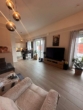 Wohnzimmer - Schöner Wohnen !! Exklusive 2 Zi.Penthouse Wohnung mit riesiger Sonnenterrasse in Norderstedt - Harksheide zu vermieten !!!