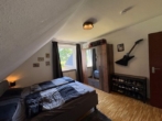 Schlafzimmer 1 - Traumhafte 2 Zimmer DG Wohnung mit großem Balkon in einem 4 Familienhaus in Norderstedt-Garstedt zu vermieten!!!