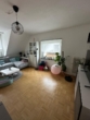 Wohnzimmer - Wunderschöne und moderne 2 Zimmer DG - Wohnung in einem 4 Fam. Haus in Norderstedt-Garstedt zu vermieten !!!!