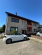 Außenansicht - Hübsche modernisierte 2,5 Zimmer EG-Wohnung mit Balkon in Norderstedt-Garstedt zu vermieten !!