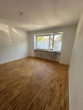 Wohnzimmer - Hübsche modernisierte 2,5 Zimmer EG-Wohnung mit Balkon in Norderstedt-Garstedt zu vermieten !!