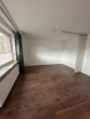 Wohnzimmer 1 - Top modernisierte 1 Zimmer EG Wohnung mit Balkon in Norderstedt - Harksheide zu vermieten !!