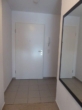 Flur mit Garderobe - Trendige 1 Zimmer Neubau-Wohnung mit Balkon und Carport in Bönningstedt zu vermieten !!!